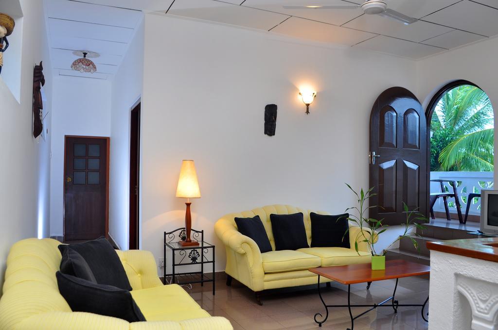 Ayubowan Guesthouse Negombo Ruang foto